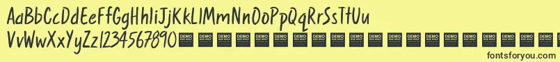 Шрифт SweetNothingsDemo – чёрные шрифты на жёлтом фоне