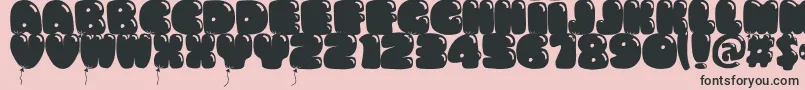 フォントBumbazo – ピンクの背景に黒い文字