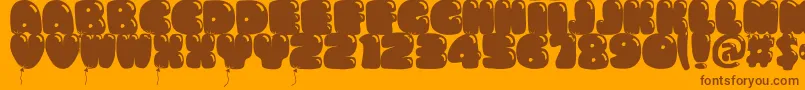 Bumbazo Font – Brown Fonts on Orange Background