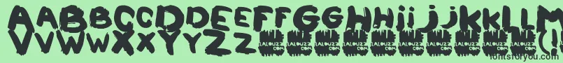 Lalouzz Font – Black Fonts on Green Background