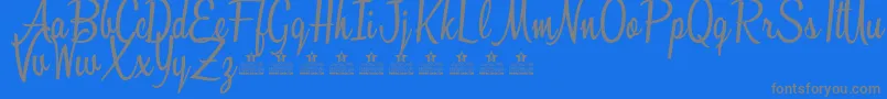 SunshineBoulevardPersonalUse-fontti – harmaat kirjasimet sinisellä taustalla