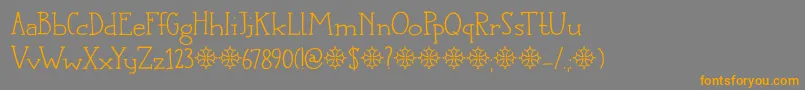 フォントDkLanguedoc – オレンジの文字は灰色の背景にあります。