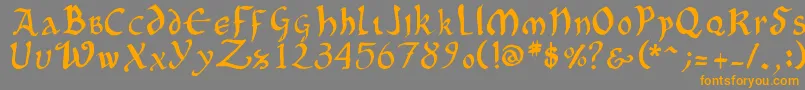 フォントOncialePhf01 – オレンジの文字は灰色の背景にあります。