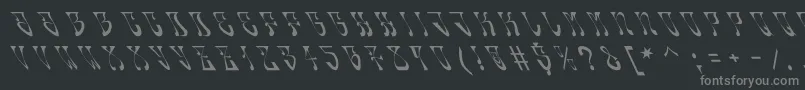 Oldskool-fontti – harmaat kirjasimet mustalla taustalla