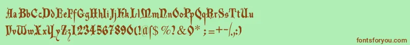 Decadentafrax-Schriftart – Braune Schriften auf grünem Hintergrund