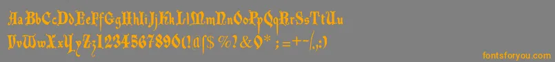 フォントDecadentafrax – オレンジの文字は灰色の背景にあります。