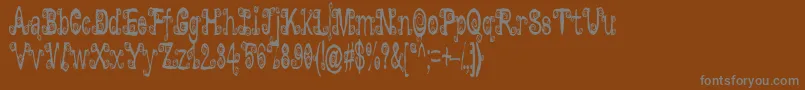 フォントLyarith ffy – 茶色の背景に灰色の文字