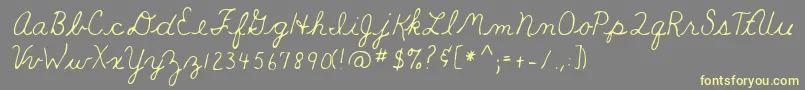 Teacher Font – Yellow Fonts on Gray Background