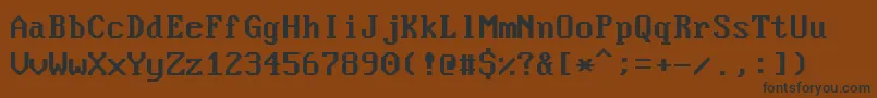 フォントNouveauIbm – 黒い文字が茶色の背景にあります
