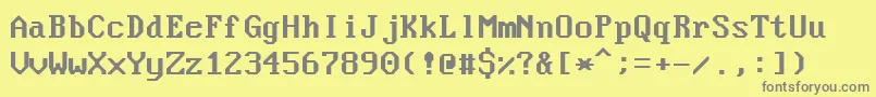 フォントNouveauIbm – 黄色の背景に灰色の文字