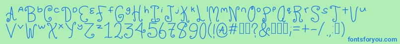 フォントChuckles – 青い文字は緑の背景です。