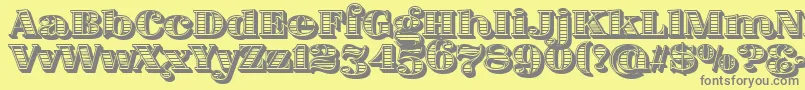 FatFlamingo5WoodcutInner Font – Gray Fonts on Yellow Background