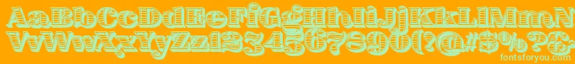 FatFlamingo5WoodcutInner-Schriftart – Grüne Schriften auf orangefarbenem Hintergrund