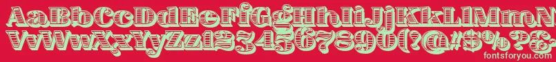 フォントFatFlamingo5WoodcutInner – 赤い背景に緑の文字