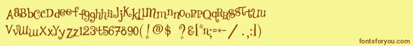 フォントTsCurly – 茶色の文字が黄色の背景にあります。