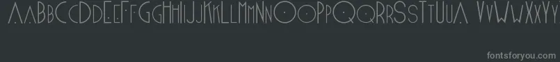 Blake-fontti – harmaat kirjasimet mustalla taustalla