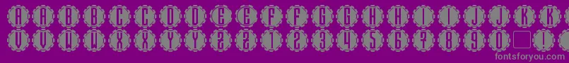 fuente SteamcogCaps – Fuentes Grises Sobre Fondo Morado