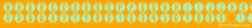 SteamcogCaps Font – Green Fonts on Orange Background