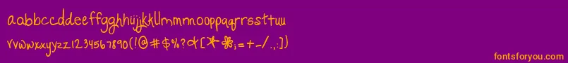 Шрифт PromisedFreedom – оранжевые шрифты на фиолетовом фоне