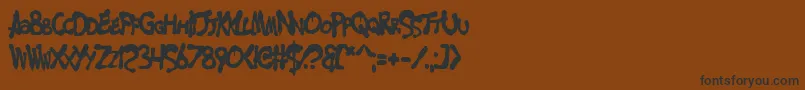 MerseyCowboy Font – Black Fonts on Brown Background