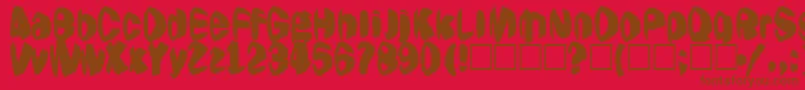 Jestering Font – Brown Fonts on Red Background