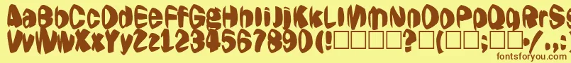 Jestering Font – Brown Fonts on Yellow Background