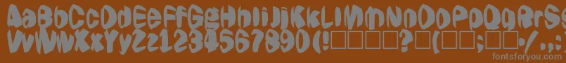 Шрифт Jestering – серые шрифты на коричневом фоне
