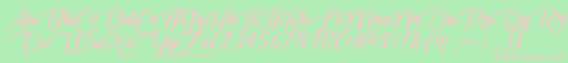 LiarScriptTtf-fontti – vaaleanpunaiset fontit vihreällä taustalla