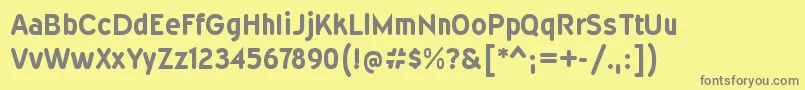 WevlicdrgBold-fontti – harmaat kirjasimet keltaisella taustalla