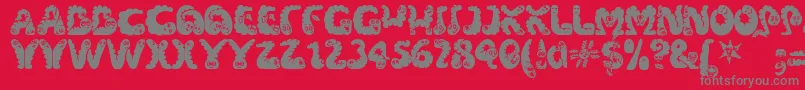 Wibbles-Schriftart – Graue Schriften auf rotem Hintergrund