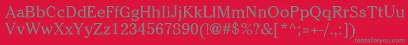 ItcCheltenhamLtBook-fontti – harmaat kirjasimet punaisella taustalla