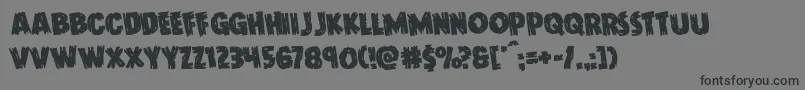 Doktermonstrorotate Font – Black Fonts on Gray Background
