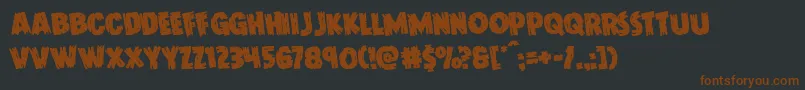 Doktermonstrorotate Font – Brown Fonts on Black Background