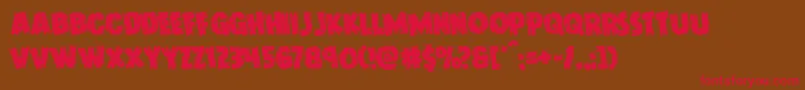 Doktermonstrorotate Font – Red Fonts on Brown Background