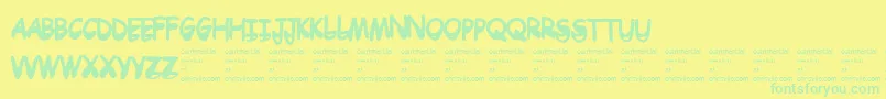 Drtoboggan Font – Green Fonts on Yellow Background