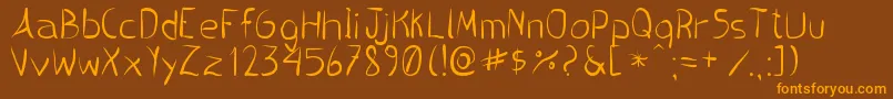 PincelHandwrite Font – Orange Fonts on Brown Background