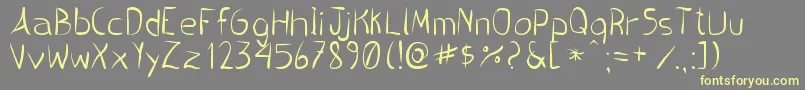 PincelHandwrite Font – Yellow Fonts on Gray Background