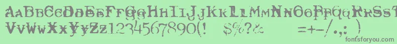 Czcionka TypewriterRoyal200Trashed – szare czcionki na zielonym tle