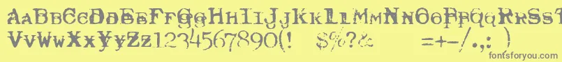 TypewriterRoyal200Trashed-Schriftart – Graue Schriften auf gelbem Hintergrund
