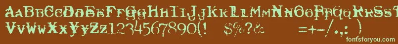 フォントTypewriterRoyal200Trashed – 緑色の文字が茶色の背景にあります。