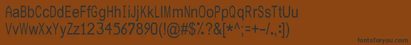 JuliasoftSpecialFontN2 Font – Black Fonts on Brown Background