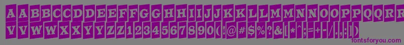 フォントATrianglercmup – 紫色のフォント、灰色の背景