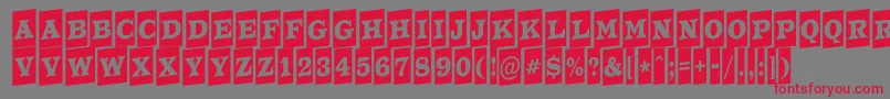ATrianglercmup-Schriftart – Rote Schriften auf grauem Hintergrund