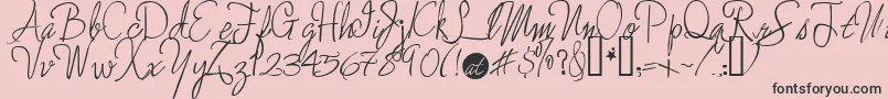 Шрифт Enchantedprairiedog – чёрные шрифты на розовом фоне