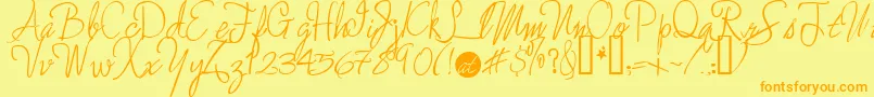 Enchantedprairiedog Font – Orange Fonts on Yellow Background