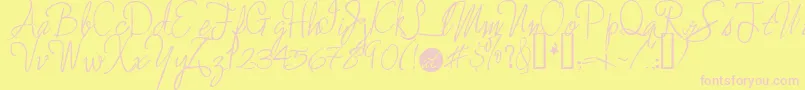 Enchantedprairiedog-fontti – vaaleanpunaiset fontit keltaisella taustalla
