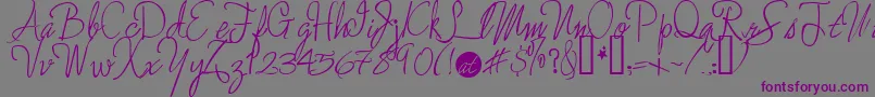 Шрифт Enchantedprairiedog – фиолетовые шрифты на сером фоне