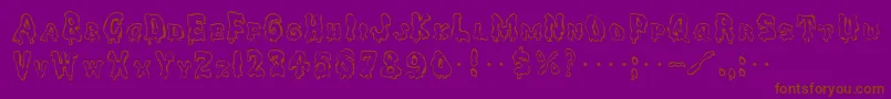 GeSpooks Font – Brown Fonts on Purple Background