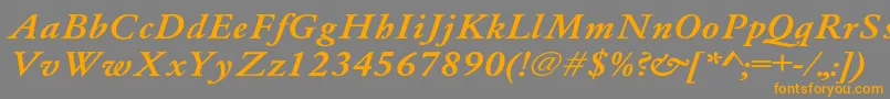 Weitere Informationen zur Whittiedmediu4-Schriftart Whittiedmediu4-Schriftart – Orangefarbene Schriften auf grauem Hintergrund
