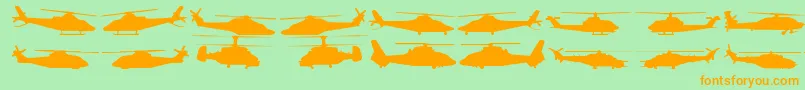 Hellocopters2-Schriftart – Orangefarbene Schriften auf grünem Hintergrund